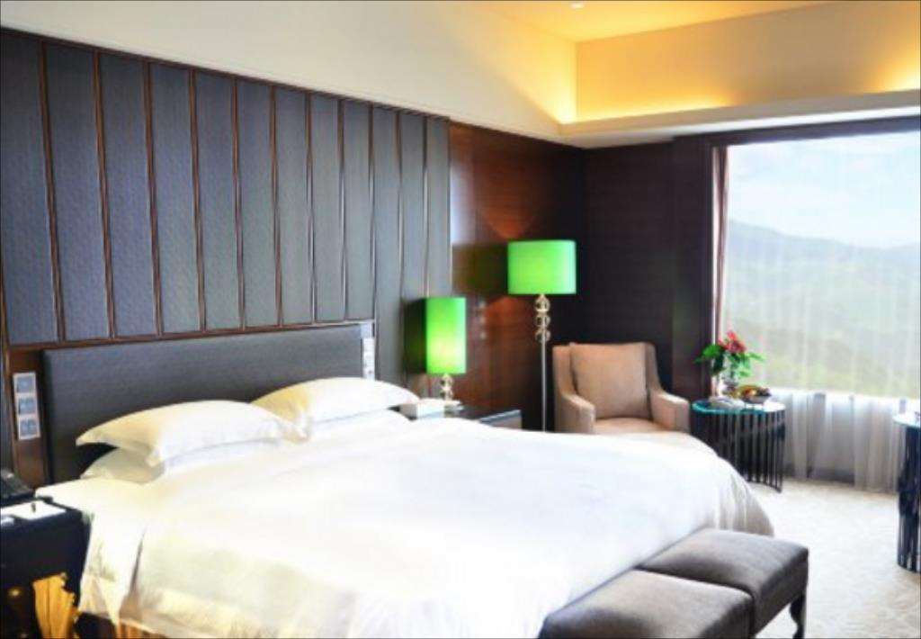 Malachite Hotel Dongguan Дунгуань Номер фото